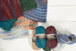 Mary Maxim Aspen -Clover Store AspenRovingYarnwithsamplesonshiplap